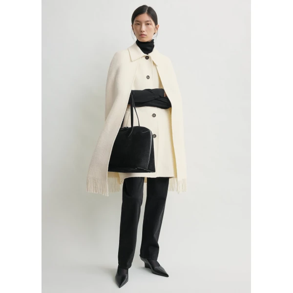 Totême Fringe cape coat in Winter white - Jackets - Scandinavian Minimalist Luxury at Coveti