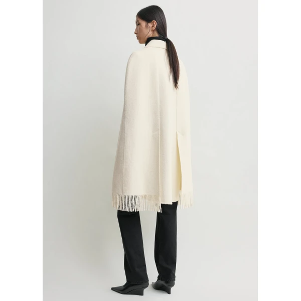Totême Fringe cape coat in Winter white - Jackets - Scandinavian Minimalist Luxury at Coveti