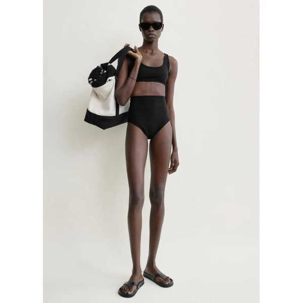 Totême High bikini bottoms in Black - Beachwear - Scandinavian Minimalist Luxury at Coveti