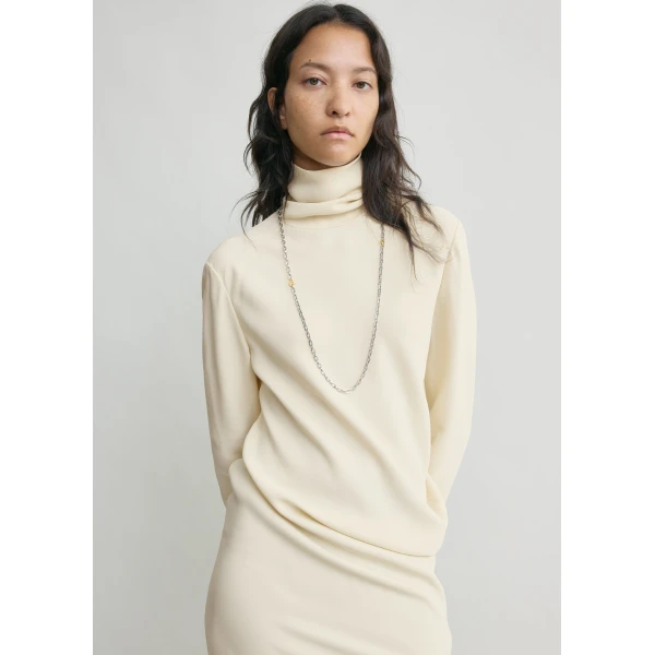 Totême High-neck twist blouse in Ecru - Tops - Scandinavian Minimalist Luxury at Coveti