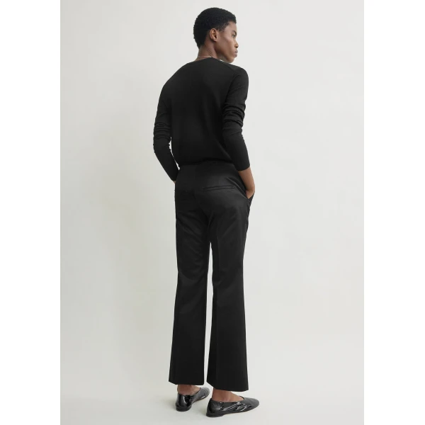 Totême Kick flare raw-edge trousers in Black - Pants - Scandinavian Minimalist Luxury at Coveti