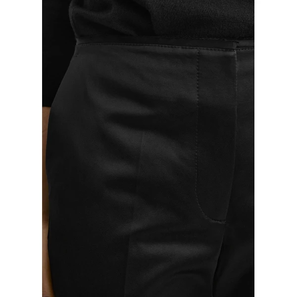 Totême Kick flare raw-edge trousers in Black - Pants - Scandinavian Minimalist Luxury at Coveti