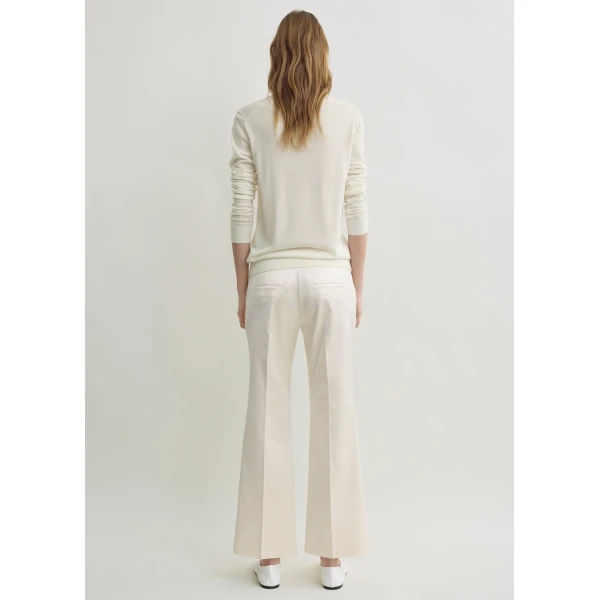 Totême Kick flare raw-edge trousers in Stone - Pants - Scandinavian Minimalist Luxury at Coveti