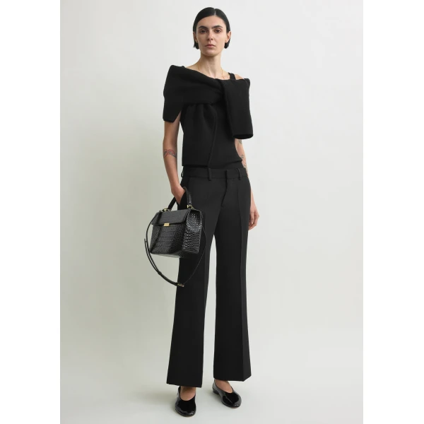 Totême Kick flare trousers in Black - Pants - Scandinavian Minimalist Luxury at Coveti