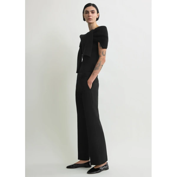 Totême Kick flare trousers in Black - Pants - Scandinavian Minimalist Luxury at Coveti