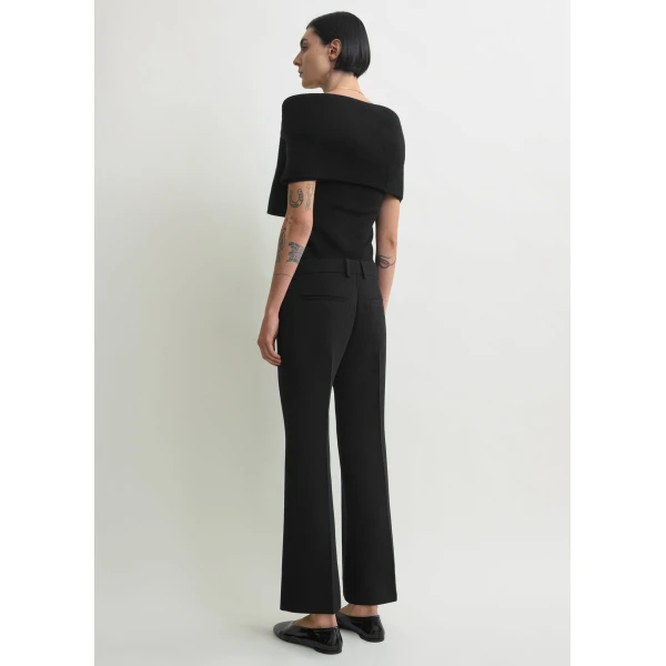 Totême Kick flare trousers in Black - Pants - Scandinavian Minimalist Luxury at Coveti