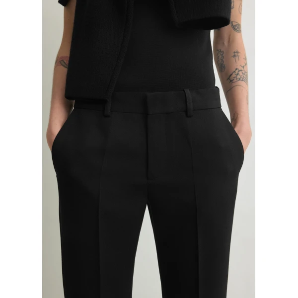 Totême Kick flare trousers in Black - Pants - Scandinavian Minimalist Luxury at Coveti
