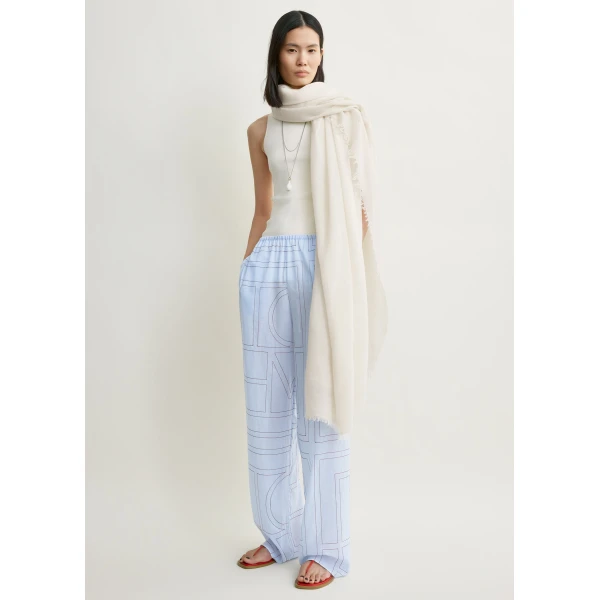 Totême Monogram cotton-blend pj bottoms in Sky - Pants - Scandinavian Minimalist Luxury at Coveti