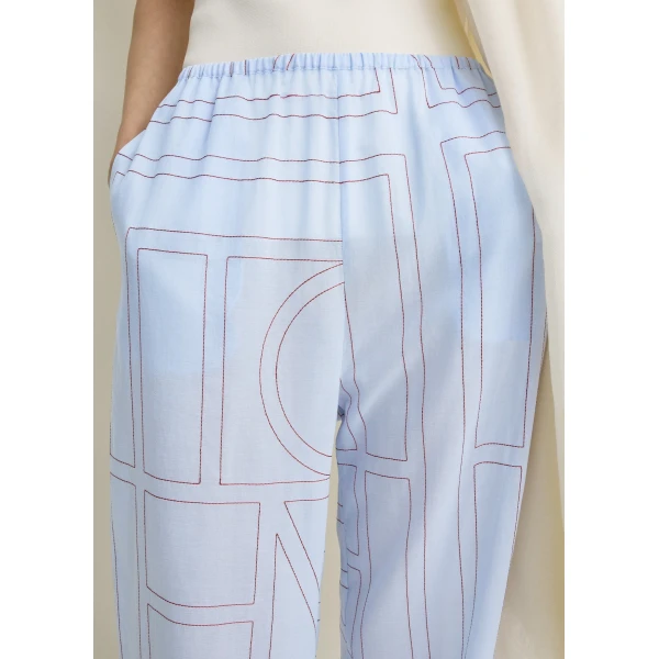 Totême Monogram cotton-blend pj bottoms in Sky - Pants - Scandinavian Minimalist Luxury at Coveti