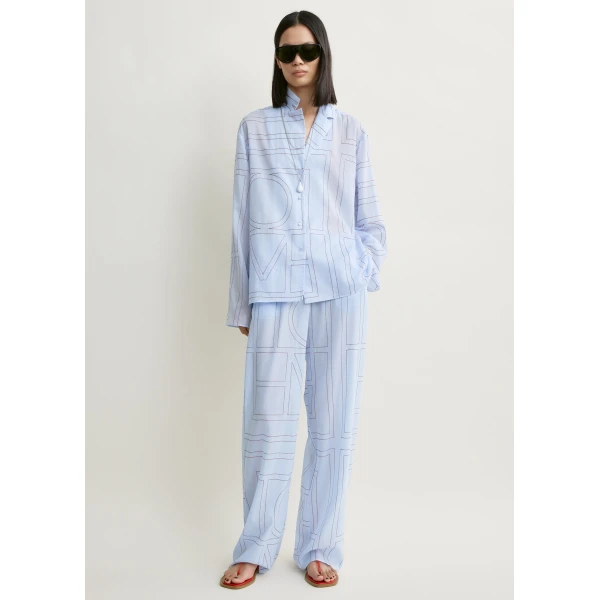 Totême Monogram cotton-blend pj top in Sky - Tops - Scandinavian Minimalist Luxury at Coveti