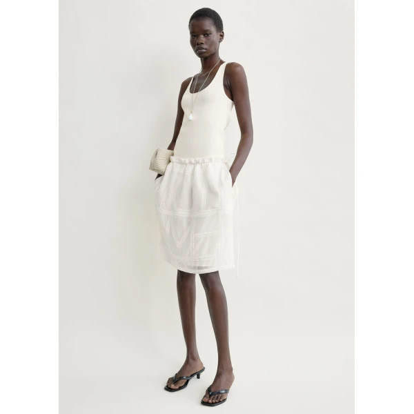 Totême Monogram mini skirt in White - Skirts - Scandinavian Minimalist Luxury at Coveti