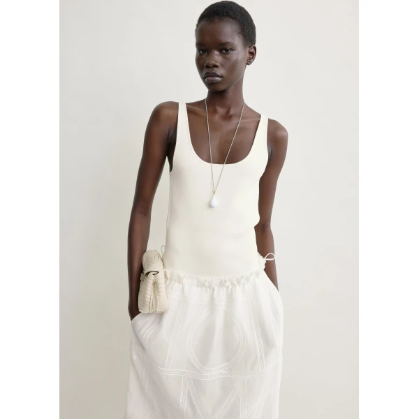 Totême Monogram mini skirt in White - Skirts - Scandinavian Minimalist Luxury at Coveti