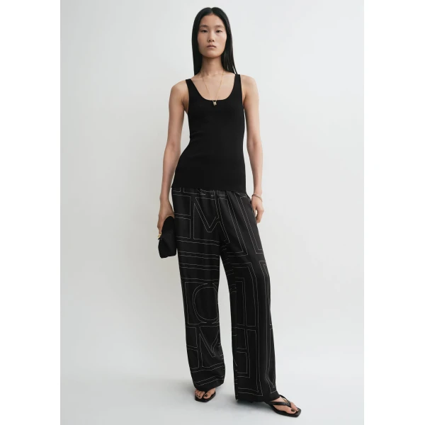 Totême Monogram silk pj bottoms black in Black monogram - Pants - Scandinavian Minimalist Luxury at Coveti