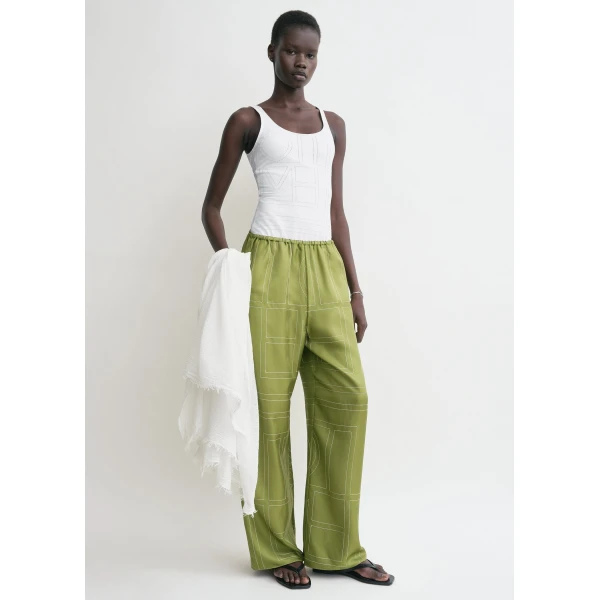 Totême Monogram silk pj bottoms in Laurel - Pants - Scandinavian Minimalist Luxury at Coveti