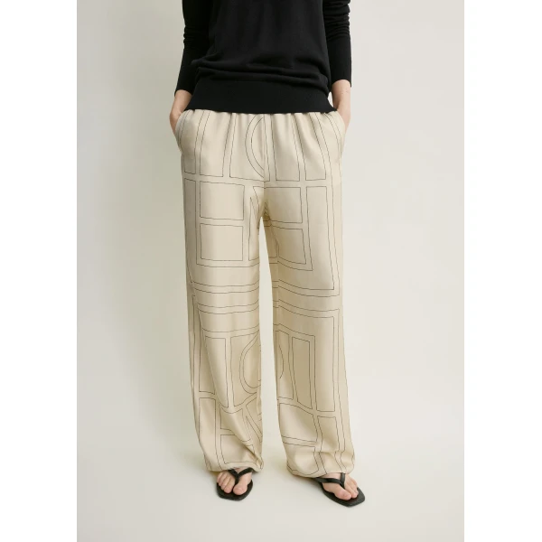 Totême Monogram silk pj bottoms ivory in Ivory monogram - Pants - Scandinavian Minimalist Luxury at Coveti