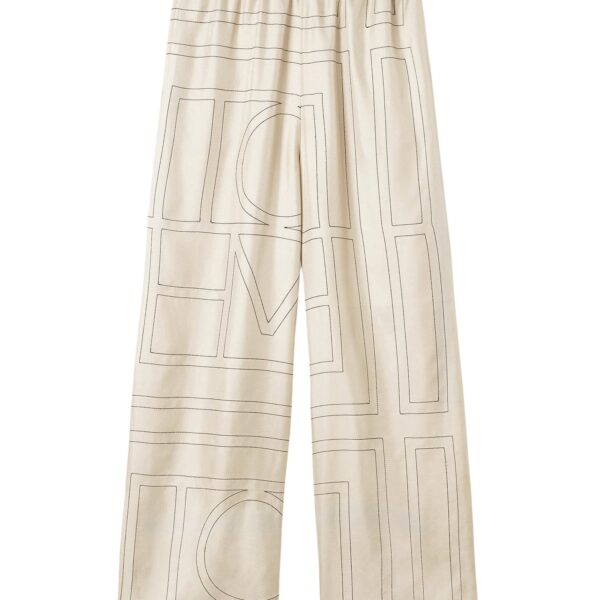 Totême Monogram silk pj bottoms ivory in Ivory monogram - Pants - Scandinavian Minimalist Luxury at Coveti