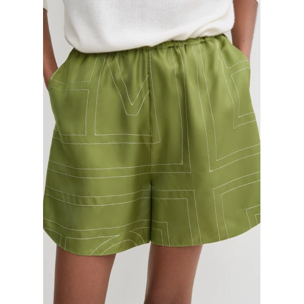 Totême Monogram silk pj shorts in Laurel - Shorts - Scandinavian Minimalist Luxury at Coveti