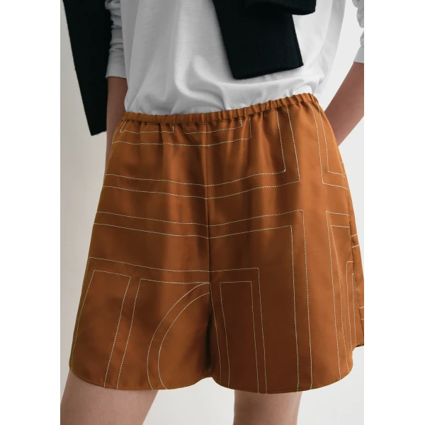 Totême Monogram silk pj shorts in Terracotta - Shorts - Scandinavian Minimalist Luxury at Coveti