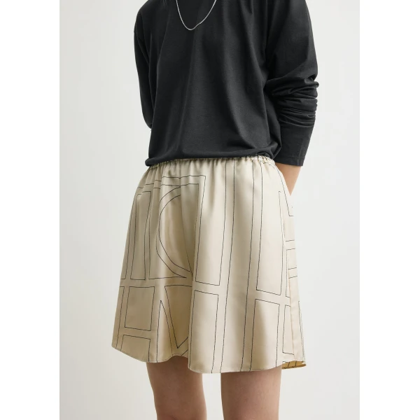 Totême Monogram silk pj shorts ivory in Ivory monogram - Pants - Scandinavian Minimalist Luxury at Coveti