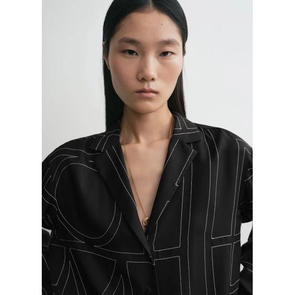 Totême Monogram silk pj top in Black - Tops - Scandinavian Minimalist Luxury at Coveti