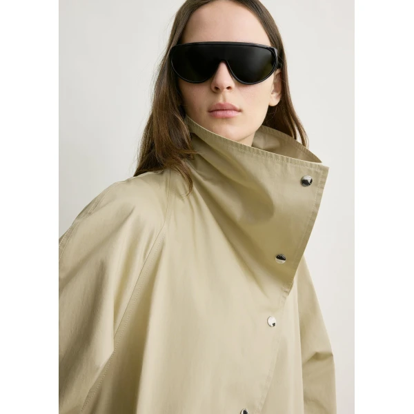 Totême Oversized cotton trench in Beige - Coats - Scandinavian Minimalist Luxury at Coveti