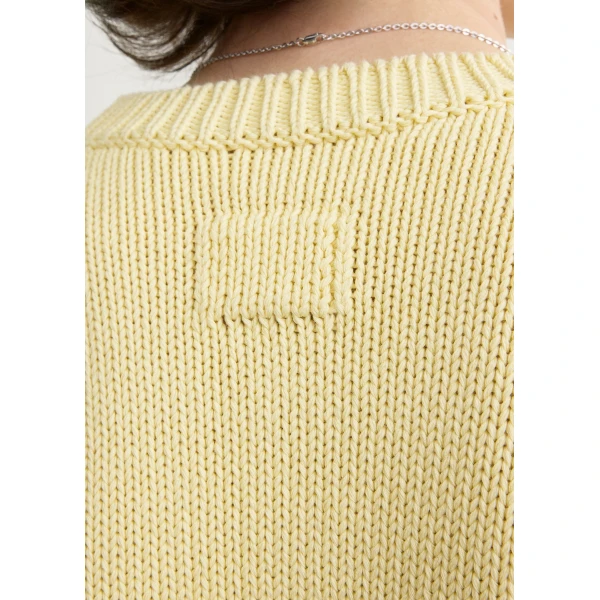 Totême Oversized crew knit in Buttercup - Knitwear - Scandinavian Minimalist Luxury at Coveti