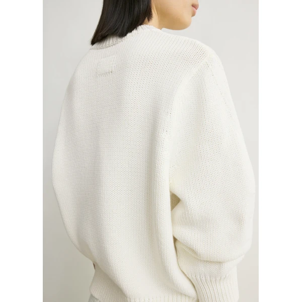 Totême Oversized crew knit in Macadamia - Knitwear - Scandinavian Minimalist Luxury at Coveti