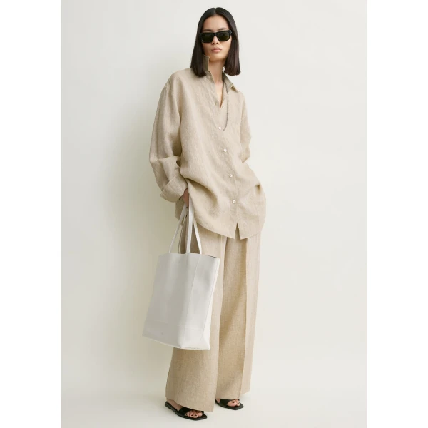 Totême Oversized summer shirt in Natural - Tops - Scandinavian Minimalist Luxury at Coveti
