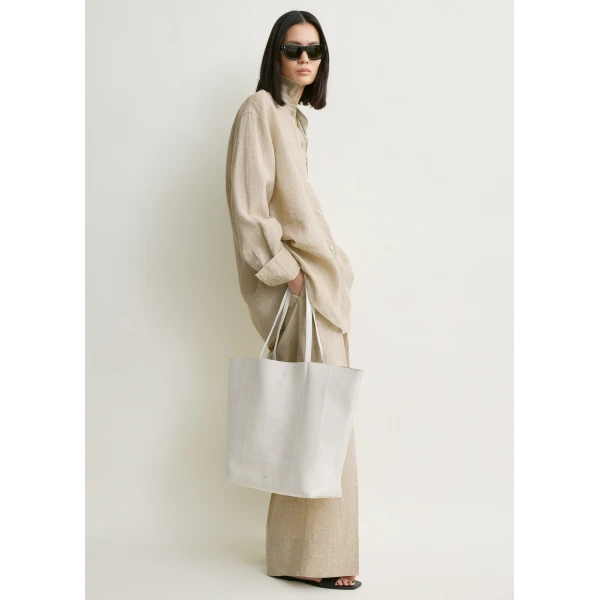Totême Oversized summer shirt in Natural - Tops - Scandinavian Minimalist Luxury at Coveti