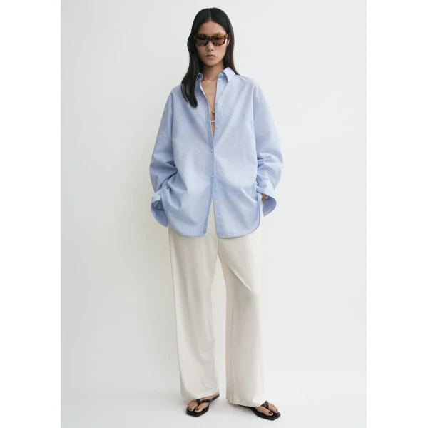 Totême Oversized summer shirt in Sky - Tops - Scandinavian Minimalist Luxury at Coveti