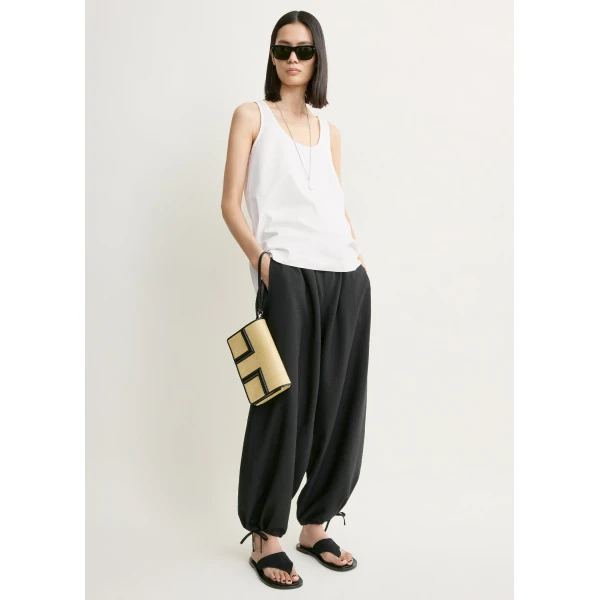 Totême Parachute trousers in Black - Pants - Scandinavian Minimalist Luxury at Coveti