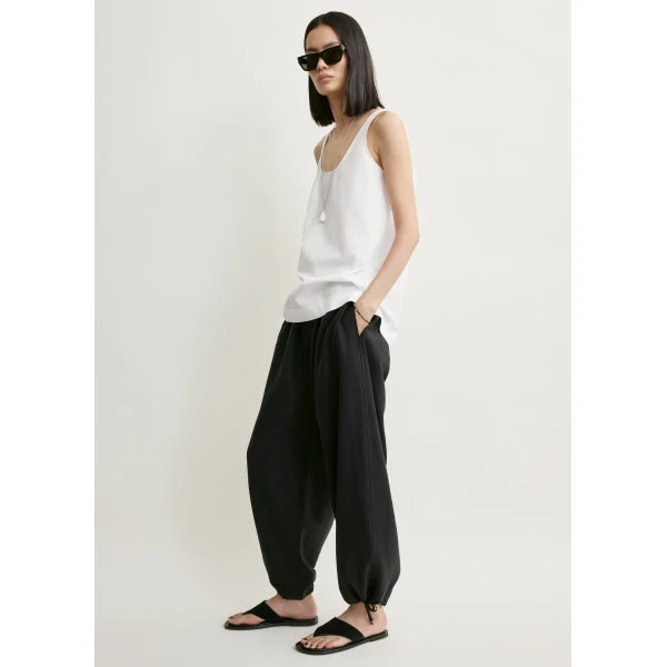 Totême Parachute trousers in Black - Pants - Scandinavian Minimalist Luxury at Coveti