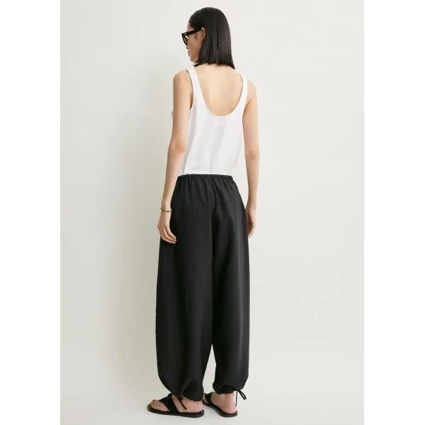 Totême Parachute trousers in Black - Pants - Scandinavian Minimalist Luxury at Coveti