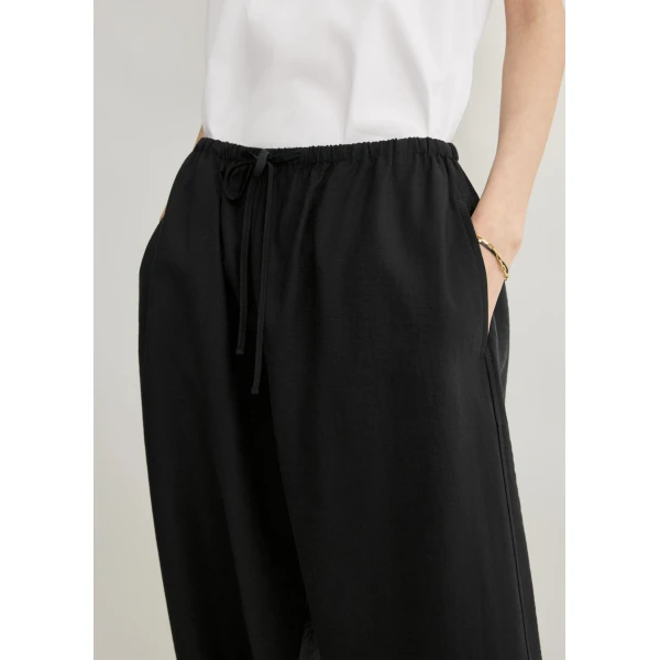 Totême Parachute trousers in Black - Pants - Scandinavian Minimalist Luxury at Coveti
