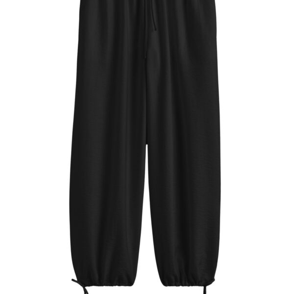 Totême Parachute trousers in Black - Pants - Scandinavian Minimalist Luxury at Coveti