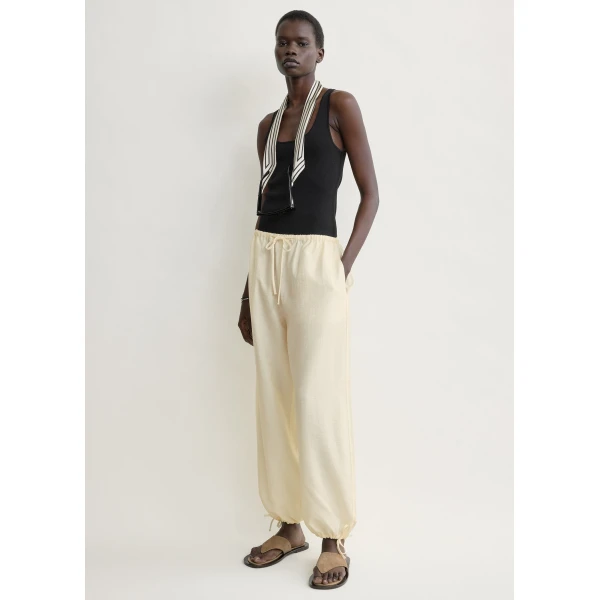 Totême Parachute trousers in Off-white - Pants - Scandinavian Minimalist Luxury at Coveti