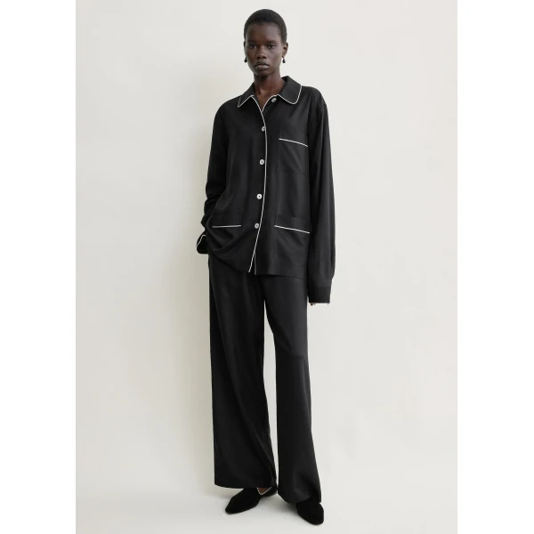 Totême Piped pj top in Black - Tops - Scandinavian Minimalist Luxury at Coveti