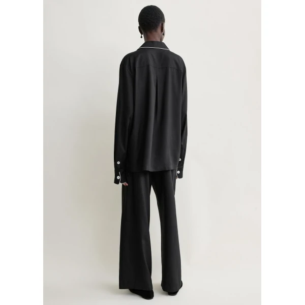 Totême Piped pj top in Black - Tops - Scandinavian Minimalist Luxury at Coveti