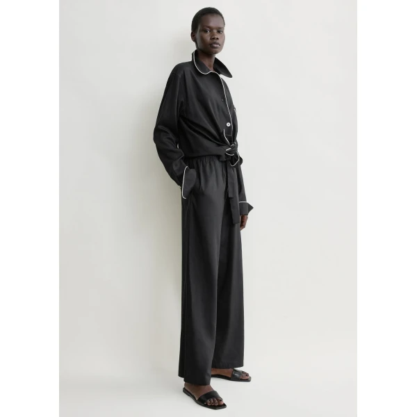 Totême Piped silk trousers in Black - Pants - Scandinavian Minimalist Luxury at Coveti