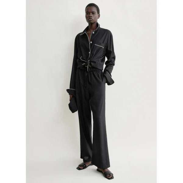 Totême Piped silk trousers in Black - Pants - Scandinavian Minimalist Luxury at Coveti