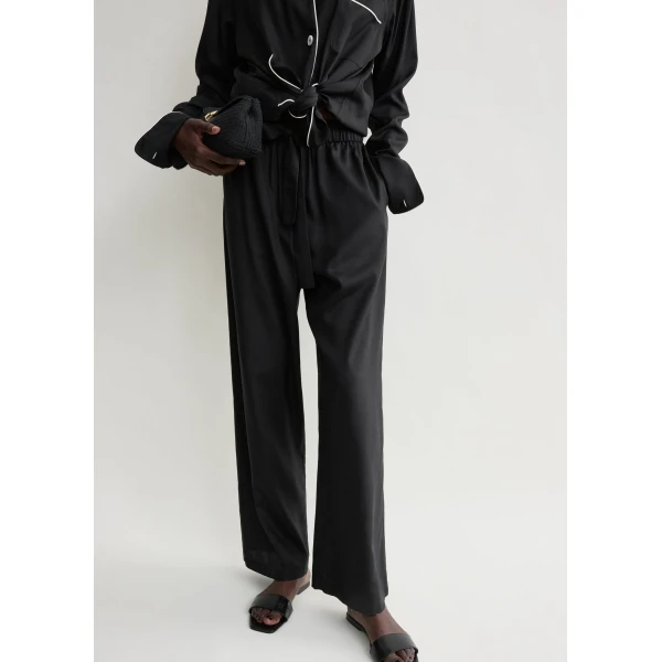 Totême Piped silk trousers in Black - Pants - Scandinavian Minimalist Luxury at Coveti