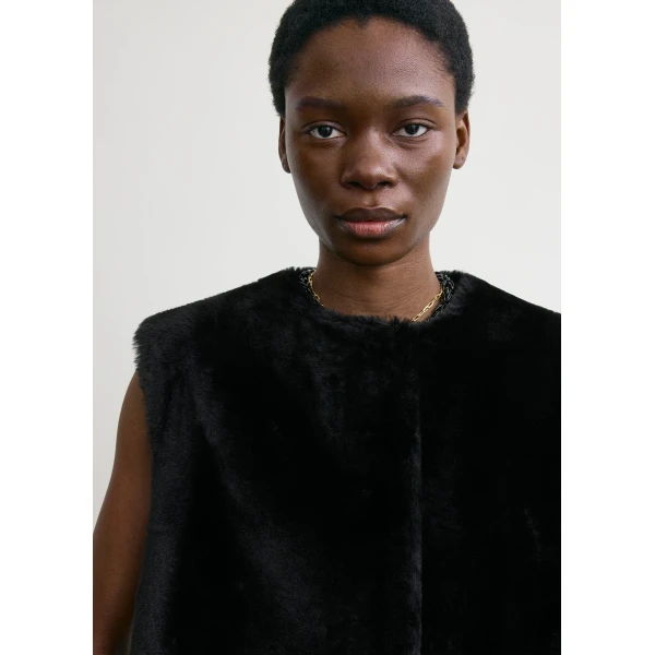 Totême Plush shearling vest in Black - Jackets - Scandinavian Minimalist Luxury at Coveti