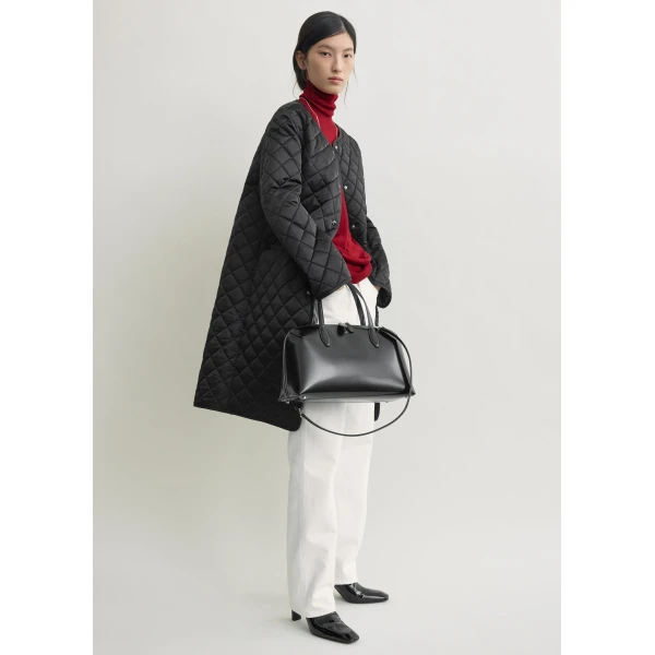 Totême Quilted collarless coat in Black - Coats - Scandinavian Minimalist Luxury at Coveti