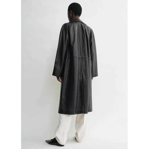 Totême Raglan-sleeve leather coat in Black - Coats - Scandinavian Minimalist Luxury at Coveti
