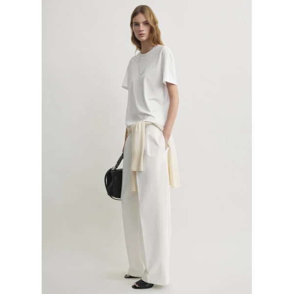 Totême Relaxed chino trousers in White - Pants - Scandinavian Minimalist Luxury at Coveti