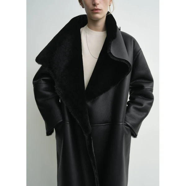 Totême Shearling wrap coat in Black - Coats - Scandinavian Minimalist Luxury at Coveti