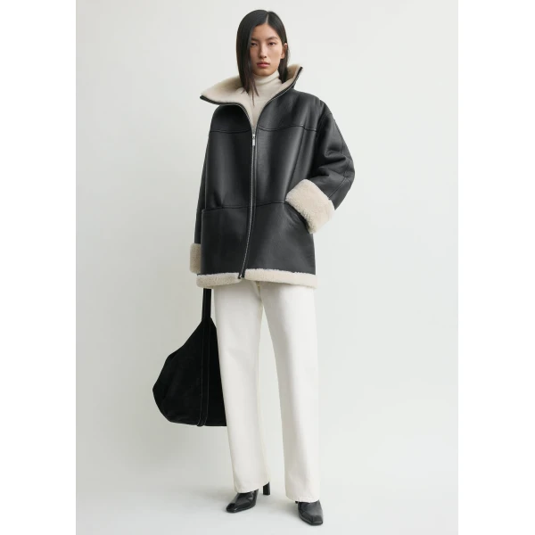 Totême Signature shearling jacket in Black / Off-white - Jackets - Scandinavian Minimalist Luxury at Coveti