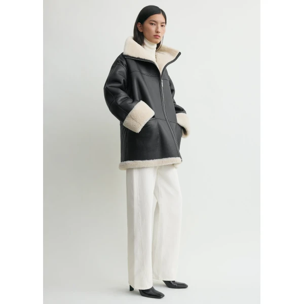 Totême Signature shearling jacket in Black / Off-white - Jackets - Scandinavian Minimalist Luxury at Coveti