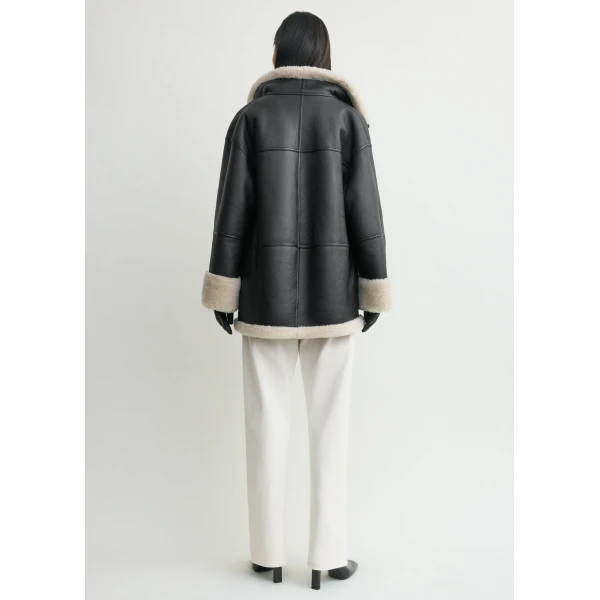 Totême Signature shearling jacket in Black / Off-white - Jackets - Scandinavian Minimalist Luxury at Coveti