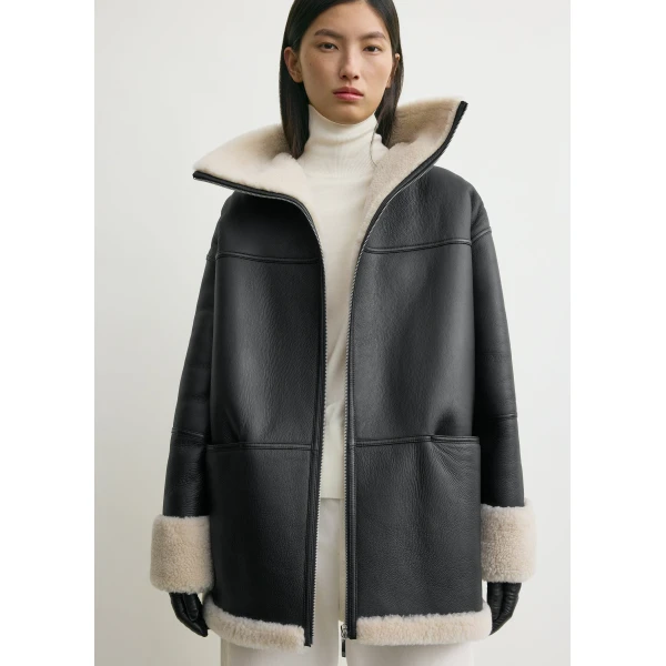 Totême Signature shearling jacket in Black / Off-white - Jackets - Scandinavian Minimalist Luxury at Coveti
